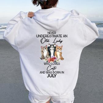 Never Underestimate An Old Lady Who Loves Cats July Women Oversized Hoodie Back Print | Mazezy