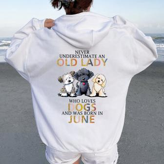 Never Underestimate Old Lady Loves Dogs Born In June Women Oversized Hoodie Back Print - Seseable