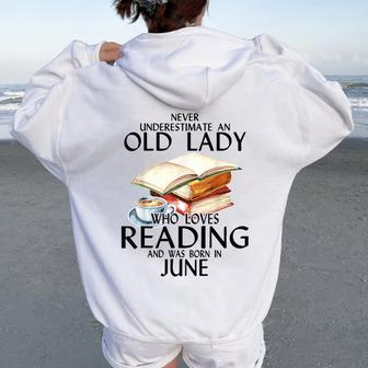 Never Underestimate An Old Lady Who Loves Reading June Women Oversized Hoodie Back Print | Mazezy