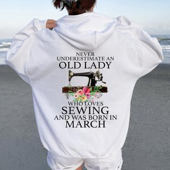 Never Underestimate An Old Lady Who Loves Sewing March Women Oversized Hoodie Back Print - Seseable