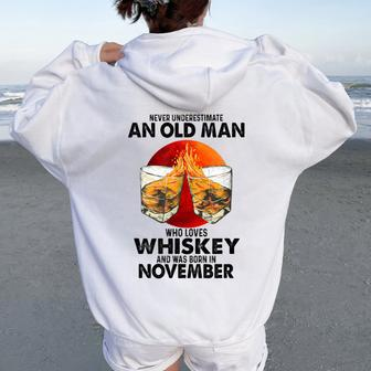 Never Underestimate An Old November Man Who Loves Whiskey Women Oversized Hoodie Back Print - Seseable
