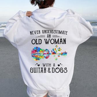 Never Underestimate An Old Woman With A Guitar And Dogs Women Oversized Hoodie Back Print - Monsterry UK