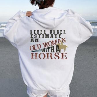 Never Underestimate An Old Woman With A Horse Women Oversized Hoodie Back Print - Monsterry UK
