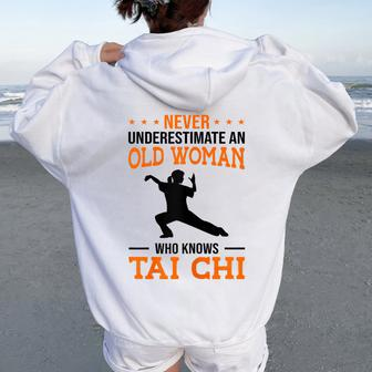 Never Underestimate An Old Woman Who Knows Tai Chi Fight Women Oversized Hoodie Back Print | Mazezy CA