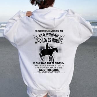 Never Underestimate An Old Woman Who Loves Horses Women Oversized Hoodie Back Print - Thegiftio UK