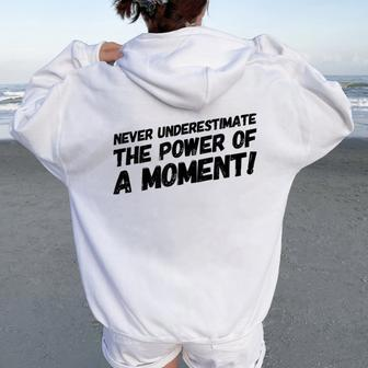 Never Underestimate The Power Of A Moment Women Oversized Hoodie Back Print - Monsterry UK