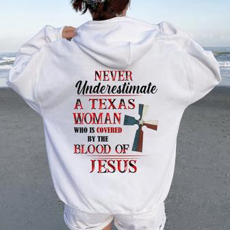 Never Underestimate A Texas Woman Who Is Covered Jesus Women Oversized Hoodie Back Print | Mazezy