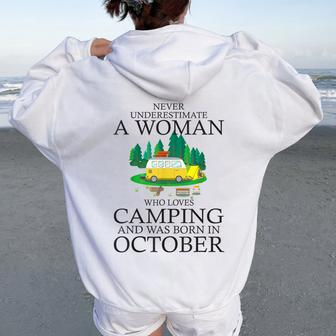Never Underestimate A Woman Who Loves Camping Born October Women Oversized Hoodie Back Print | Mazezy