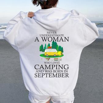 Never Underestimate A Woman Who Loves Camping Born September Women Oversized Hoodie Back Print | Mazezy