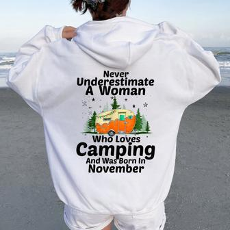 Never Underestimate A Woman Who Loves Camping November Girls Women Oversized Hoodie Back Print | Mazezy