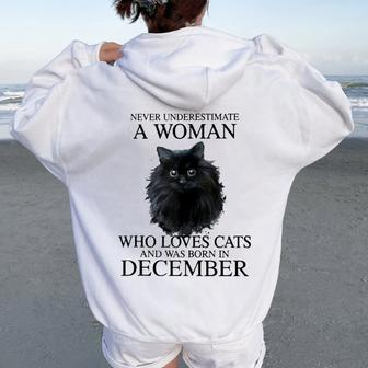 Never Underestimate A Woman Who Loves Cats Born In December Women Oversized Hoodie Back Print - Seseable