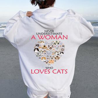 Never Underestimate A Woman Who Loves Cats T Women Oversized Hoodie Back Print - Seseable