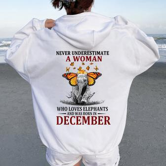 Never Underestimate A Woman Who Loves Elephants December Women Oversized Hoodie Back Print - Thegiftio UK