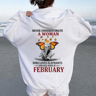 Never Underestimate A Woman Who Loves Elephants February Women Oversized Hoodie Back Print - Thegiftio UK