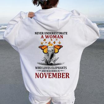 Never Underestimate A Woman Who Loves Elephants November Women Oversized Hoodie Back Print - Thegiftio UK