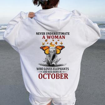 Never Underestimate A Woman Who Loves Elephants October Women Oversized Hoodie Back Print - Thegiftio
