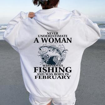 Never Underestimate A Woman Who Loves Fishing February Women Oversized Hoodie Back Print - Thegiftio UK