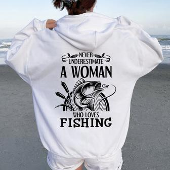 Never Underestimate A Woman Who Loves Fishing Fisher Women Oversized Hoodie Back Print - Seseable