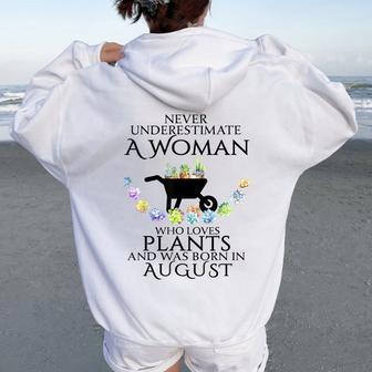 Never Underestimate A Woman Loves Plants August Women Oversized Hoodie Back Print - Seseable