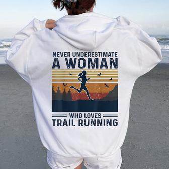 Never Underestimate A Woman Who Loves Trail Running Women Oversized Hoodie Back Print - Thegiftio UK