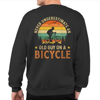 Bike Vintage Never Underestimate An Old Guy On A Bicycle Sweatshirt Back Print - Seseable