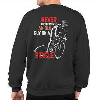 Cycling Never Underestimate An Old Guy Sweatshirt Back Print - Monsterry UK