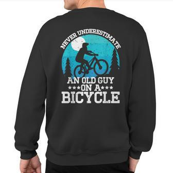 Cycling Never Underestimate An Old Guy On A Bicycle Sweatshirt Back Print - Monsterry AU