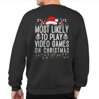 Gamer Most Likely To Play Video Games On Christmas Sweatshirt Back Print - Monsterry