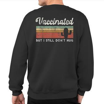 I'm Fully Vaccinated But I Still Don't Hug Introvert Serape Sweatshirt Back Print | Mazezy
