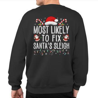 Most Likely To Fix Santa Sleigh Christmas Believe Santa Sweatshirt Back Print - Thegiftio UK