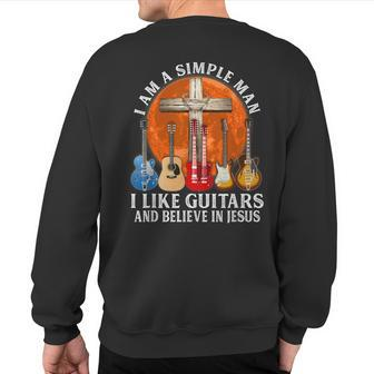 I Am A Simple Man I Like Guitars And Believe In Jesus Sweatshirt Back Print | Mazezy