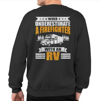 Never Underestimate A Firefighter With An Rv Camping Sweatshirt Back Print - Monsterry UK
