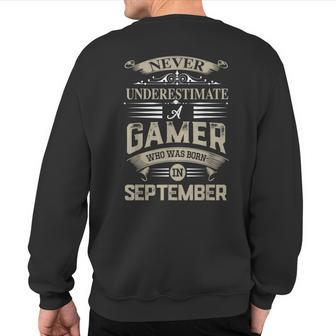 Never Underestimate A Gamer Who Was Born In September Sweatshirt Back Print - Seseable