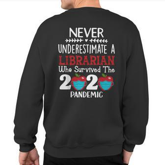 Never Underestimate A Librarian Who Survived The Pandemic Sweatshirt Back Print - Monsterry UK