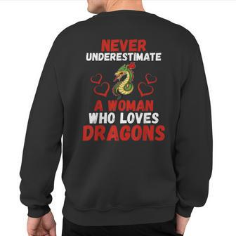 Never Underestimate Love Dragons Graphic Sweatshirt Back Print - Seseable