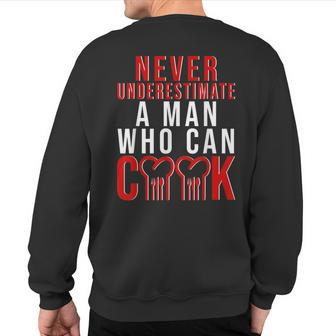 Never Underestimate A Man Who Can Cook Sweatshirt Back Print - Seseable