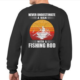 Never Underestimate A Man With A Fishing Rod Fishing Sweatshirt Back Print - Seseable