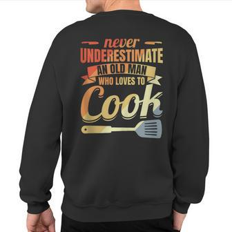 Never Underestimate An Old Cook Sweatshirt Back Print - Monsterry