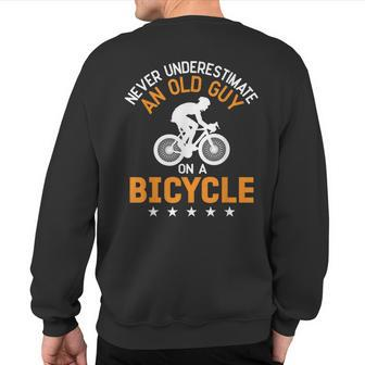 Never Underestimate An Old Guy On A Bicycle Cycling Mens Sweatshirt Back Print - Seseable