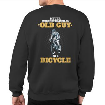 Never Underestimate An Old Guy On A Bicycle Cycling Sweatshirt Back Print - Seseable
