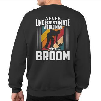 Never Underestimate An Old Man With A Broom Curler Sweatshirt Back Print - Monsterry