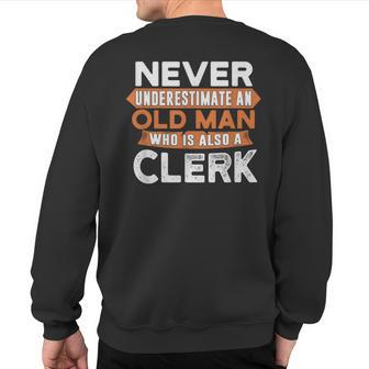 Never Underestimate An Old Man Who Is Also A Clerk Sweatshirt Back Print - Seseable