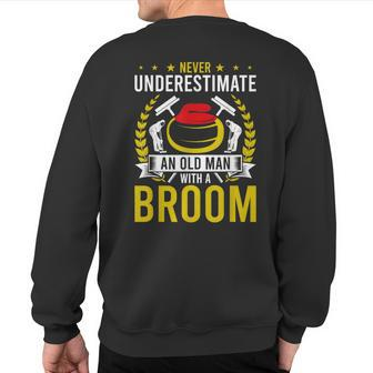 Never Underestimate An Old Man With A Curling Broom Sweatshirt Back Print - Monsterry UK