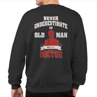 Never Underestimate An Old Man Who Is A Doctor Sweatshirt Back Print - Seseable