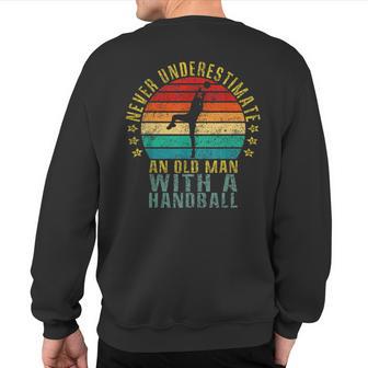 Never Underestimate An Old Man With A Handball Retro Sweatshirt Back Print - Thegiftio UK