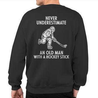 Never Underestimate An Old Man With A Hockey Stick Men Sweatshirt Back Print | Mazezy
