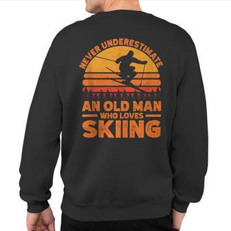 Never Underestimate An Old Man Who Loves Skiing Skiing Sweatshirt Back Print - Thegiftio UK