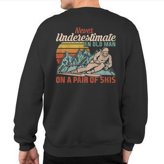 Never Underestimate An Old Man On A Pair Of Skies I Skiing Sweatshirt Back Print | Mazezy