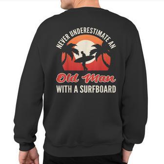 Never Underestimate An Old Man With A Surfboard Surfer Sweatshirt Back Print - Thegiftio UK