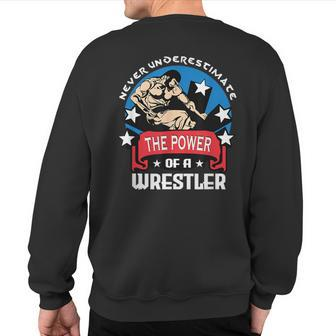 Never Underestimate The Power Of A Wrestler Wrestling Sweatshirt Back Print - Monsterry